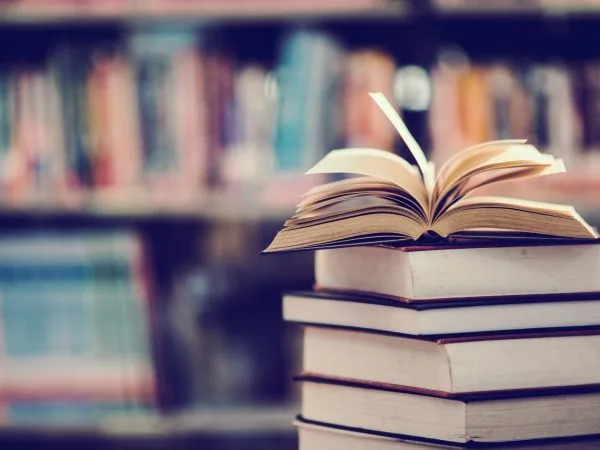 Book in library with open textbook,education learning concept